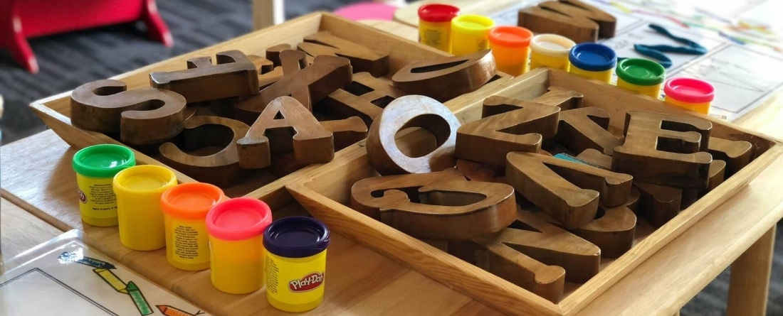 image of letters on table in preschool classroom